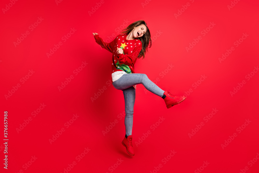 Full length body size view of her nice attractive pretty slim fit overjoyed glad cheerful cheery girl jumping having fun dancing festive mood isolated bright vivid shine vibrant red color background Full length body size view of her nice attractive pretty slim fit overjoyed glad cheerful cheery girl jumping having fun dancing festive mood isolated bright vivid shine vibrant red color background