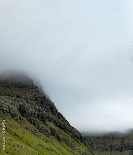 Mountains under the mist with text space
