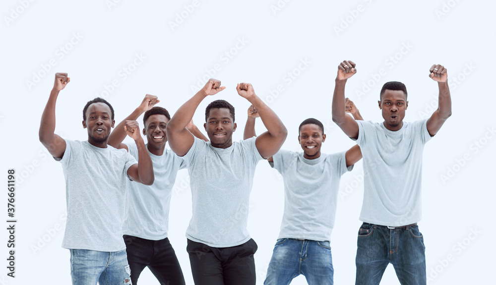 in full growth. team of confident guys standing standing with hands up in full growth. team of confident guys standing standing with hands up