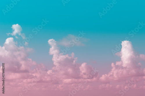 Sky background with clouds, toned pink.