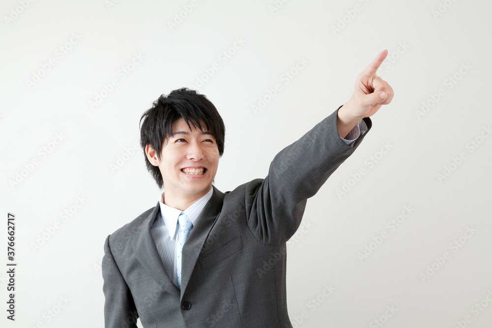 指差しするビジネスマン 指差しするビジネスマン