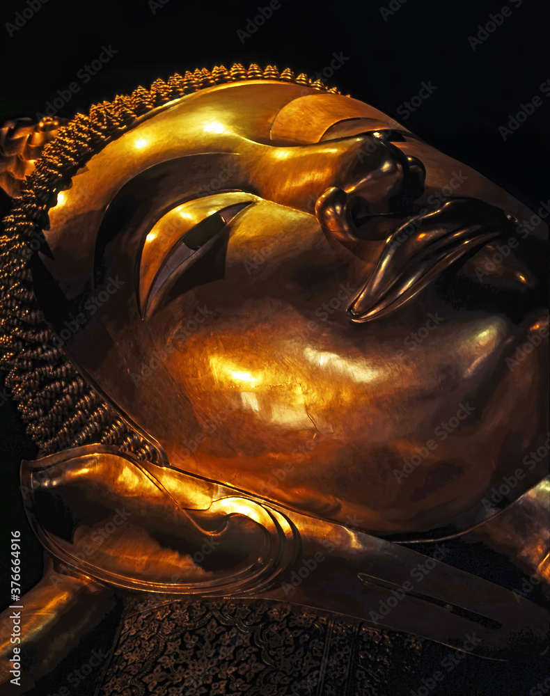 Reclining golden Buddha statue in Bangkok, Thailand