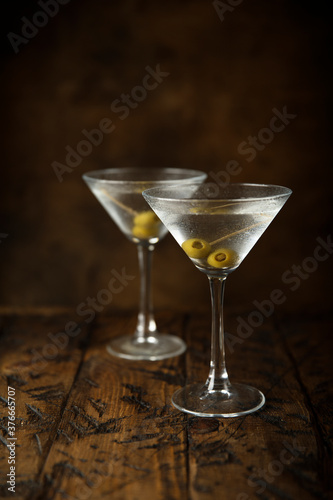 Classic martini cocktail with olives