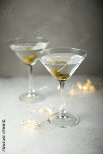 Classic martini cocktail with olives