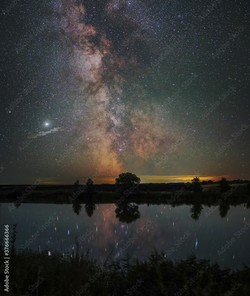 Astro-landscape. The milky way reflected in the lake Astro-landscape. The milky way reflected in the lake