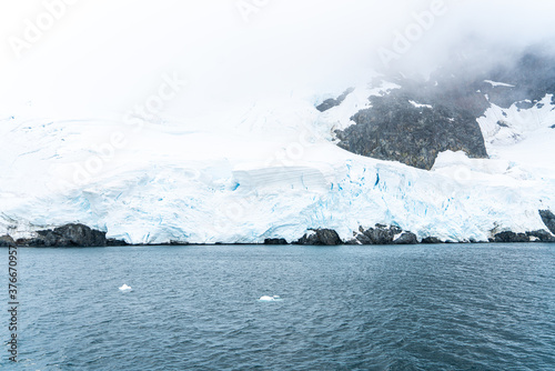 Antarctica, Antarctic Peninsula. Mountain Orne Harbour in the Gerlache Strait in 2020 photo