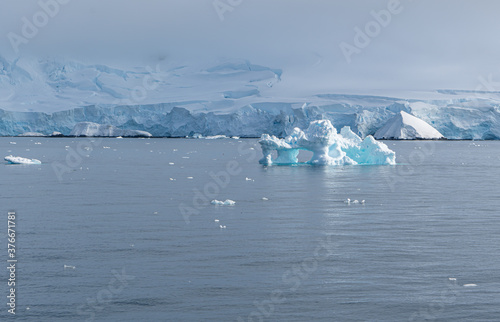 Antarctica, Antarctic Peninsula. In the Gerlach Street. Ice covered Fournier Bay and floating Icebergs