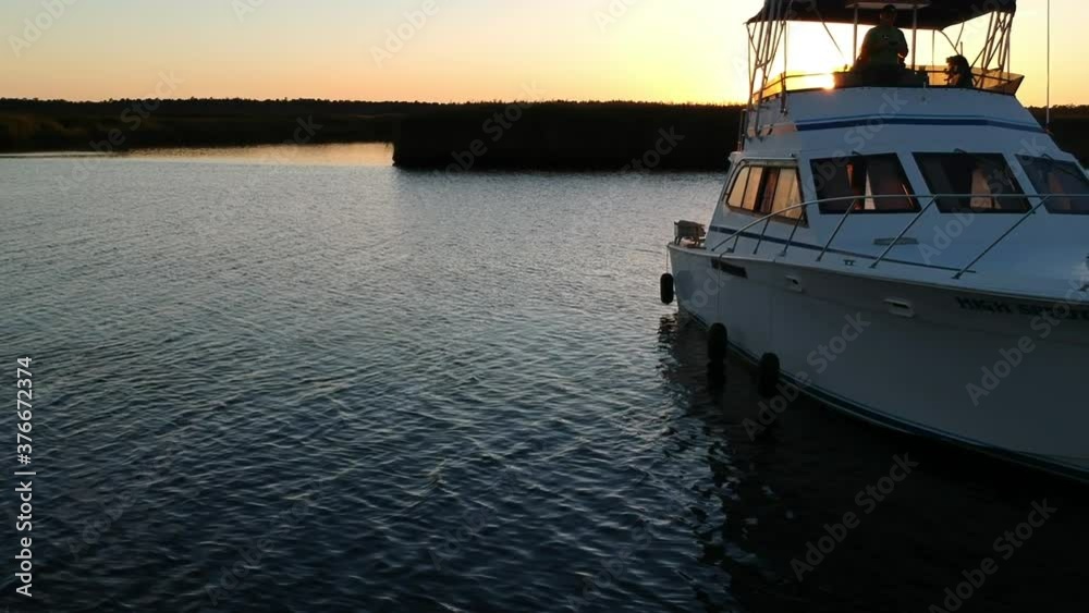 Yachting at sunset on the Great Egg Harbor River Yachting at sunset on the Great Egg Harbor River