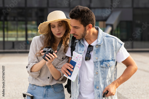 Young married couple at the train station.