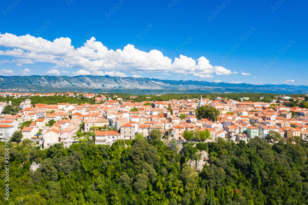 Aerial view of the old town of Omisalj on high cliff, Krk island, Kvarner, Croatia
