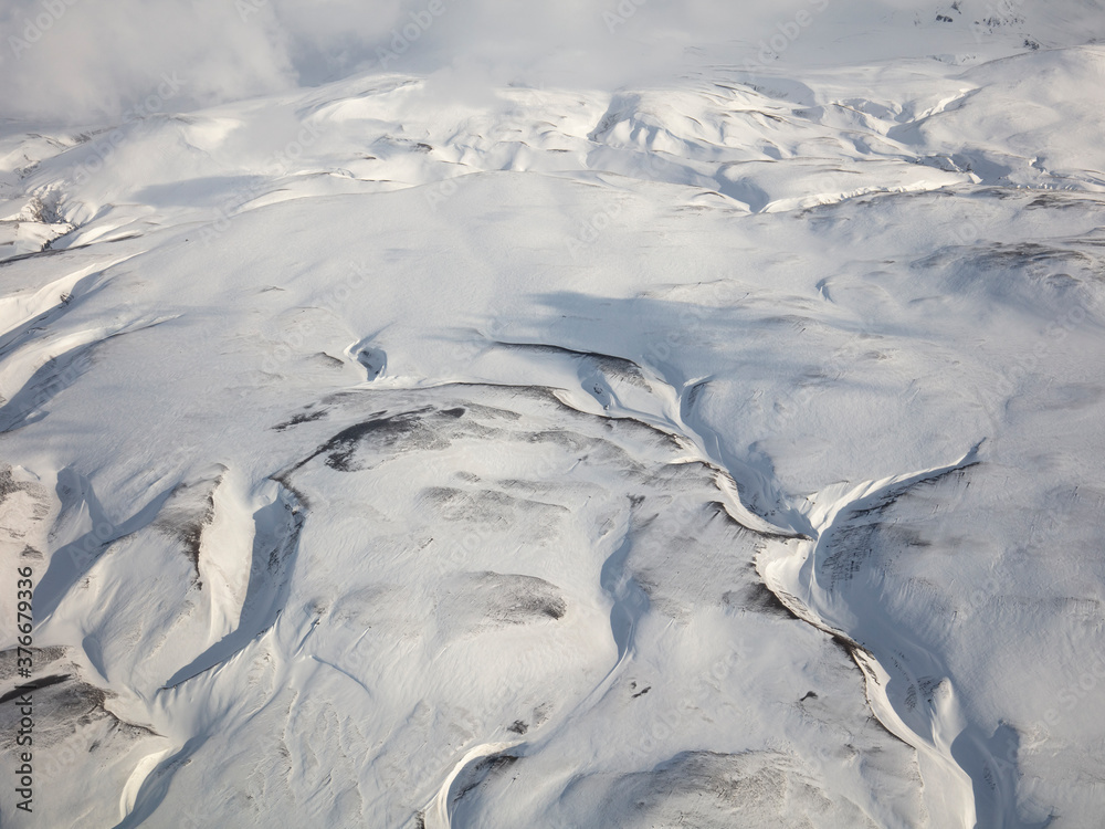 Fototapeta premium aerial view of the mountains in winter