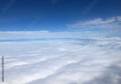 Sky view of fluffy white clouds  photo