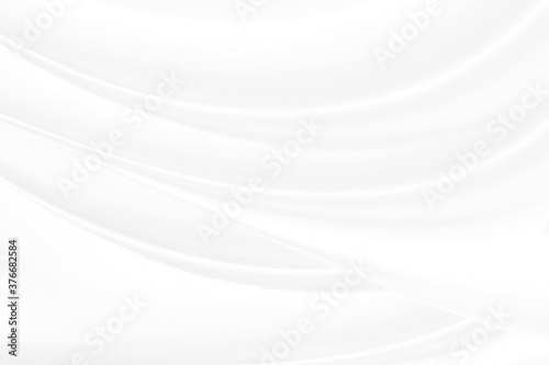 White cloth background abstract with soft waves.