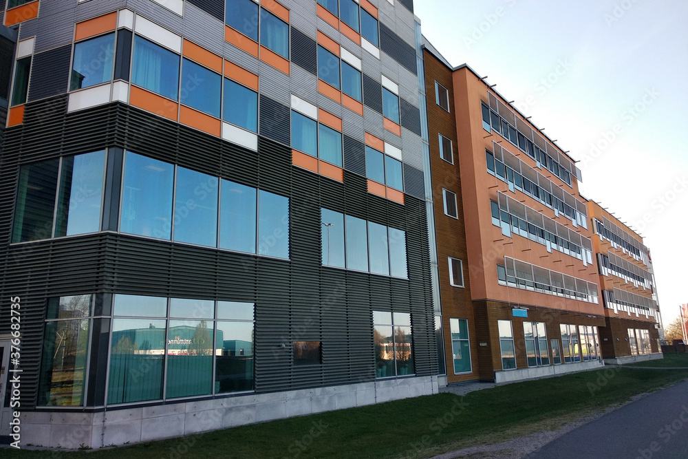 Fototapeta premium Low angle view of high multistorey office building.