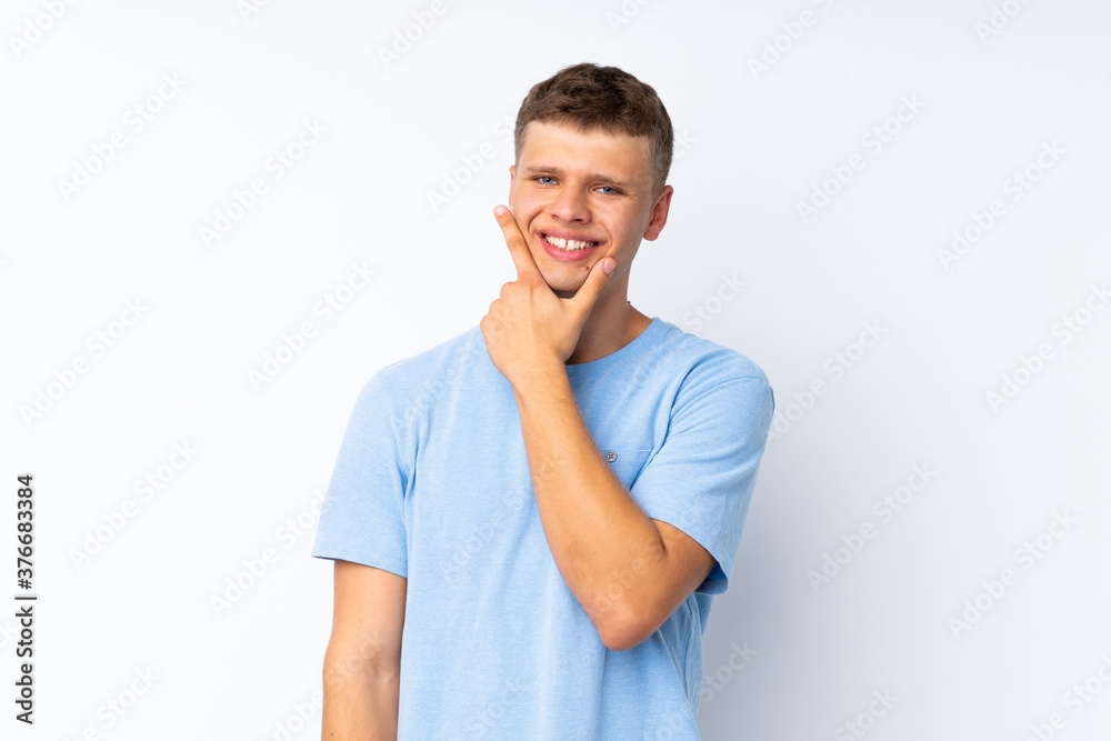 Young handsome man over isolated white background smiling Young handsome man over isolated white background smiling