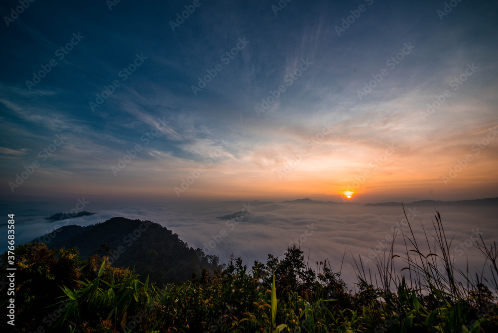 Morning scenery, sunrise time, in the middle of the sea of mist at Ayer Weng Viewpoint, Betong District, Yala Province, Thailand Morning scenery, sunrise time, in the middle of the sea of mist at Ayer Weng Viewpoint, Betong District, Yala Province, Thailand