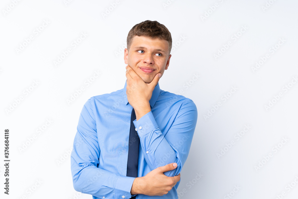 Young handsome businessman thinking an idea Young handsome businessman thinking an idea