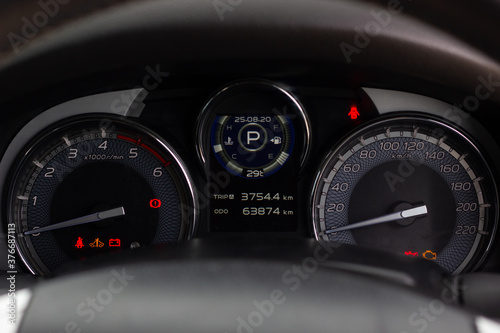 car​ instrument panel, car​ speen  motor of​ night, car​ dashboard​ modern​ automobile control​illuminated  panel​ speed display. photo