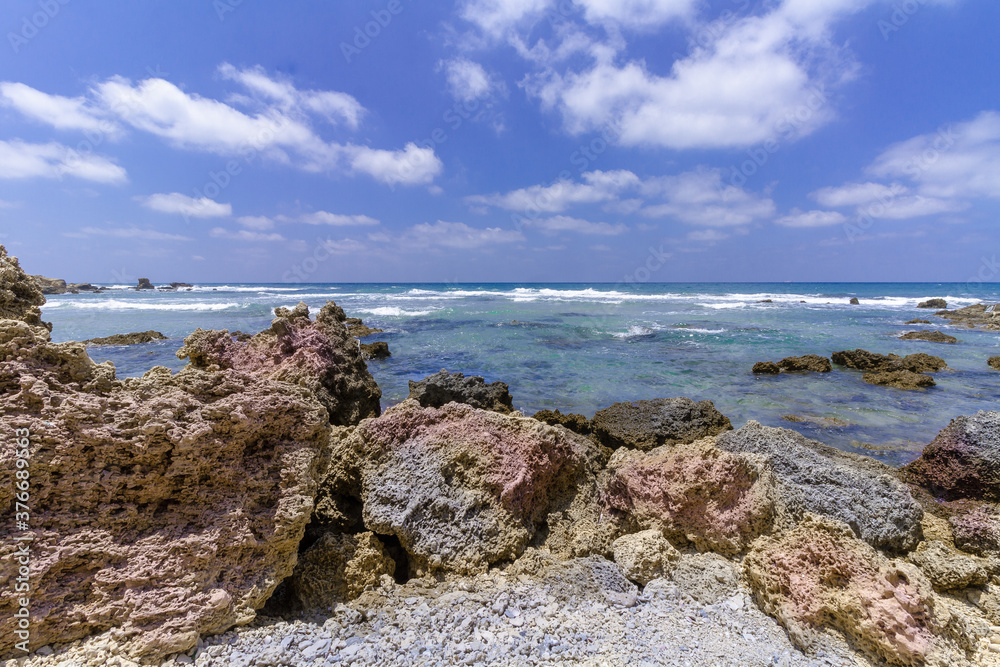 Nice view of the Mediterranean sea coast. Rocks and stones. Israel. Nice view of the Mediterranean sea coast. Rocks and stones. Israel.