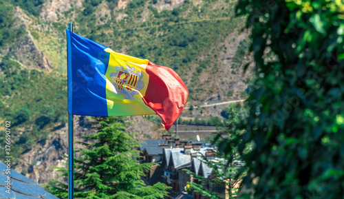 Andorran flag waving in a countryside scenery photo
