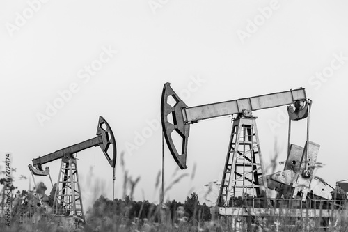 Oil pump. The equipment for oil production. Black and white photo photo