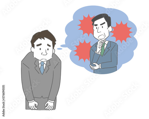 上司からの叱責で落ち込む男性