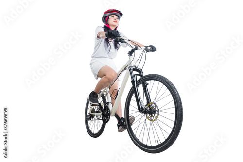 Asian woman with a bicycle helmet riding a bicycle