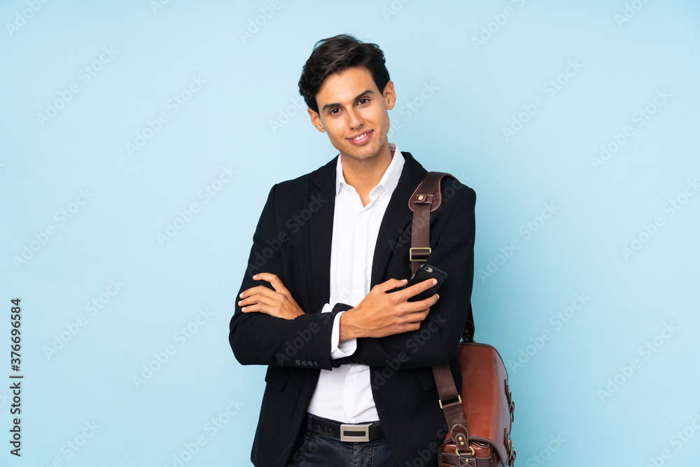 Businessman over isolated blue background laughing Businessman over isolated blue background laughing