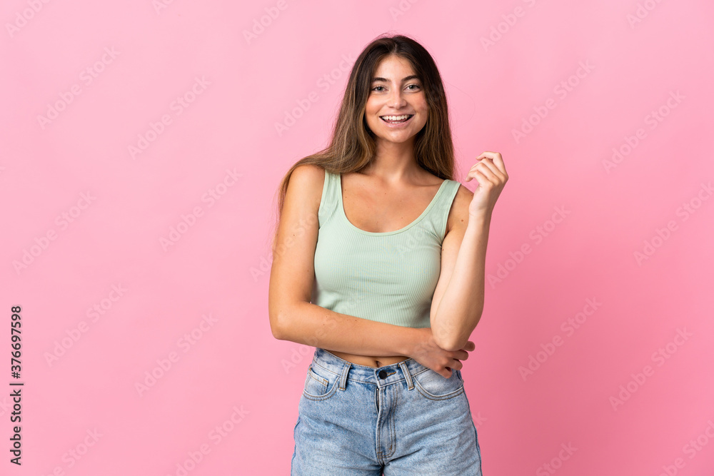 Young caucasian woman isolated on pink background laughing Young caucasian woman isolated on pink background laughing
