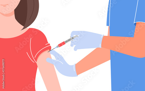 The doctor holds the syringe and puts the vaccine to a woman. Vaccination against virus. Framed picture