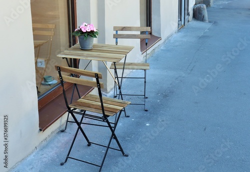 Street cafe table and two chairs