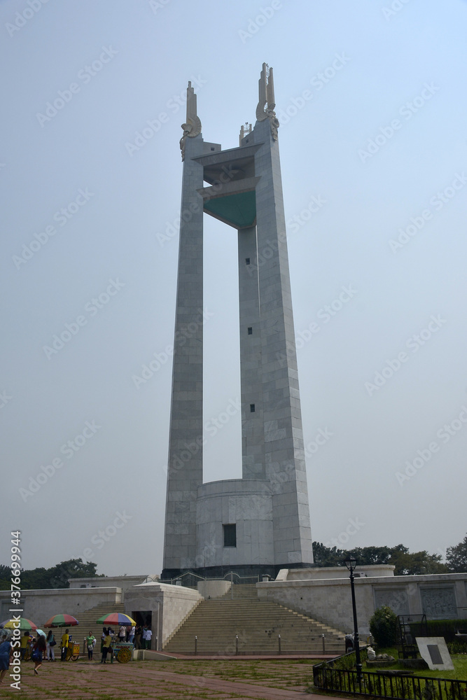 Quezon memorial circle obelisk monument tower in Quezon City, Philippines