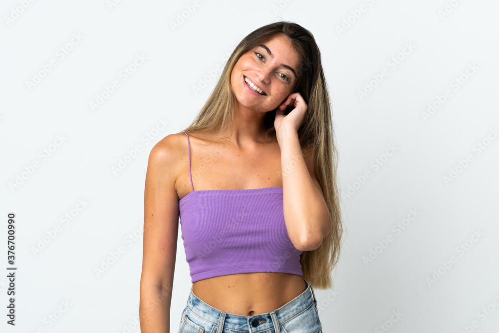 Fototapeta premium Young caucasian woman isolated on white background laughing