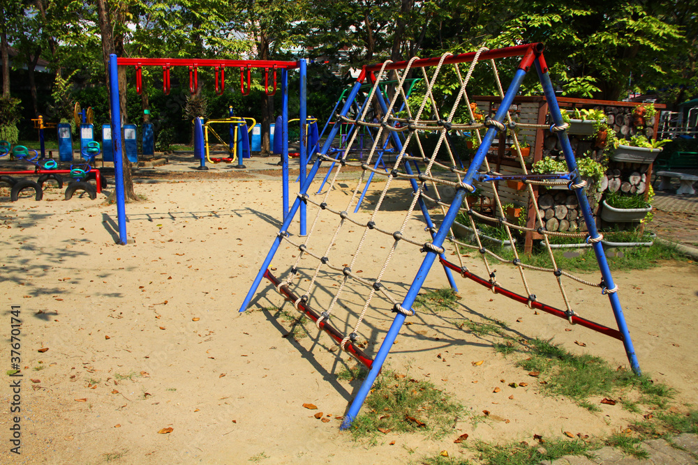 Climbing wall equipment in playground, Concept image for children outdoor activity in public park or school. Climbing wall equipment in playground, Concept image for children outdoor activity in public park or school.