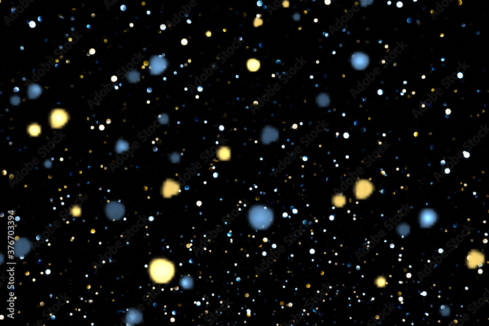 Black abstract background with bokeh lights and stars. Texture.