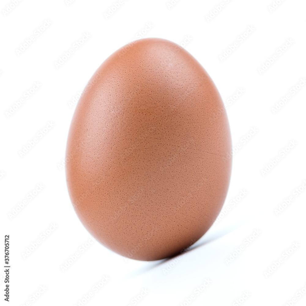 Single brown eggs isolated from white background. Single brown eggs isolated from white background.