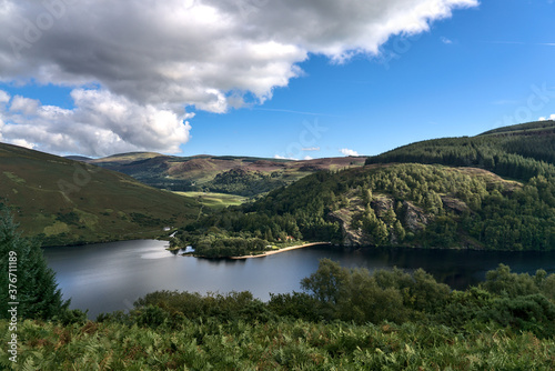 Lake surrounded by hills. Beautiful view on mountains around Lough Dan Lake, Wicklow Mountains, Ireland © Romio Shots