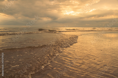 Wallpaper Mural Beautiful waves on the beach with in sunrise. Torontodigital.ca