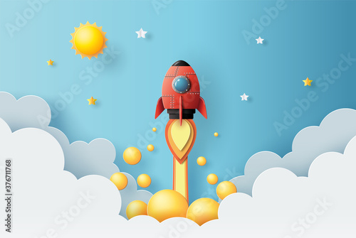 Paper art style of rocket flying in space, start-up concept, design banner template, flat-style vector illustration.