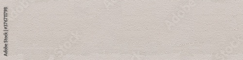 Coton canvas background in perfect white color as part of your creative work. Seamless panoramic texture.
