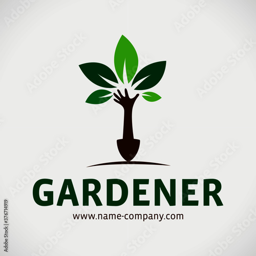 logo paysagiste jardinier pelle main arbre