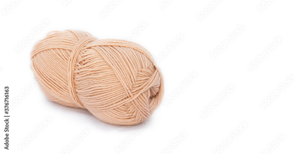 beige roll of yarn on isolated background beige roll of yarn on isolated background