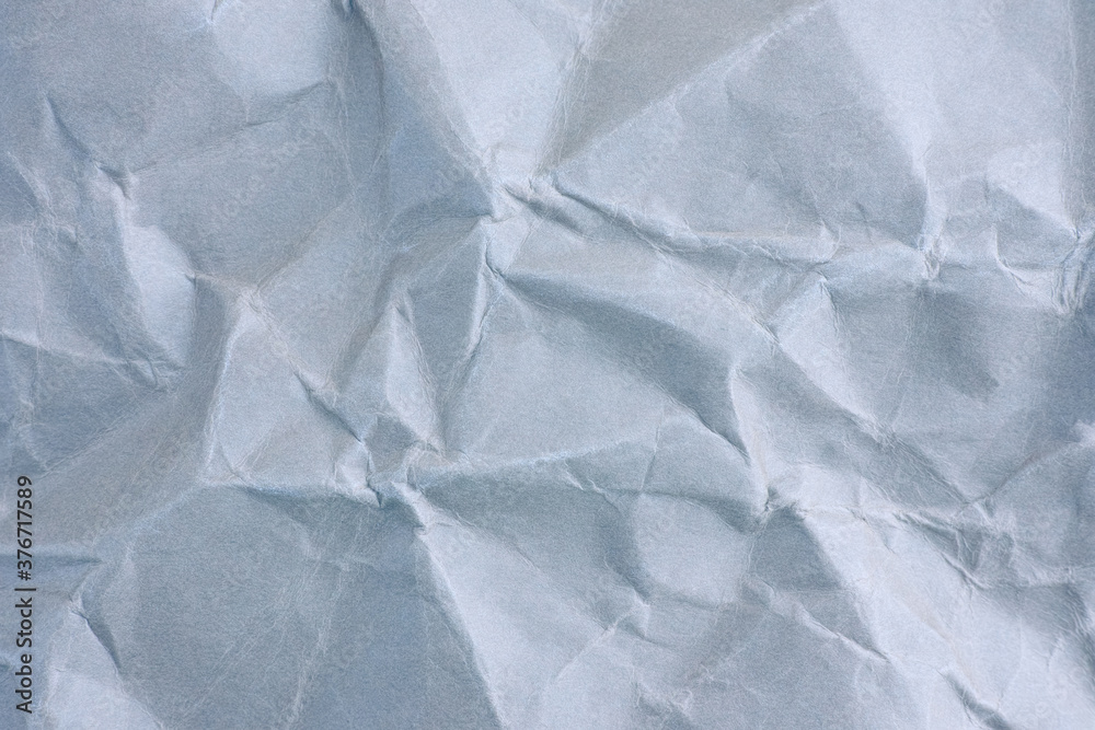 Obraz premium Light blue wrinkled paper texture background