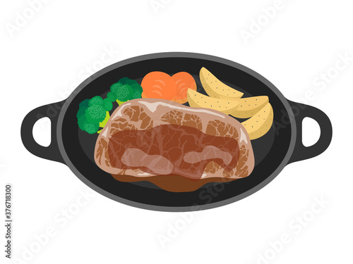 鉄板に盛られたステーキ肉のイラスト