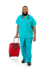 Smiling Doctor Ready To Travel With Red Suitcase