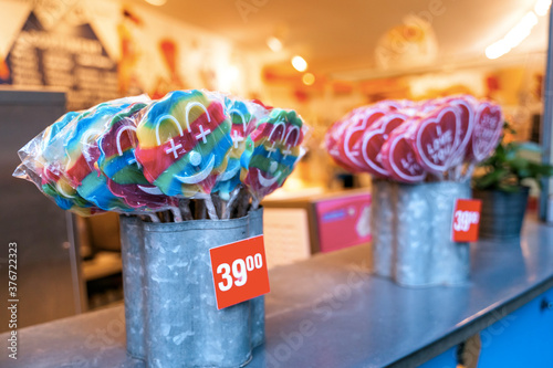 Group of packed colorful round lollipops on the market in Cophengagen photo