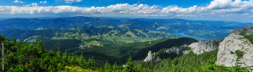 Durau village and Bicaz Lake Panorama. View from Ceahlau Mountain, Carpathian Mountains, Romania