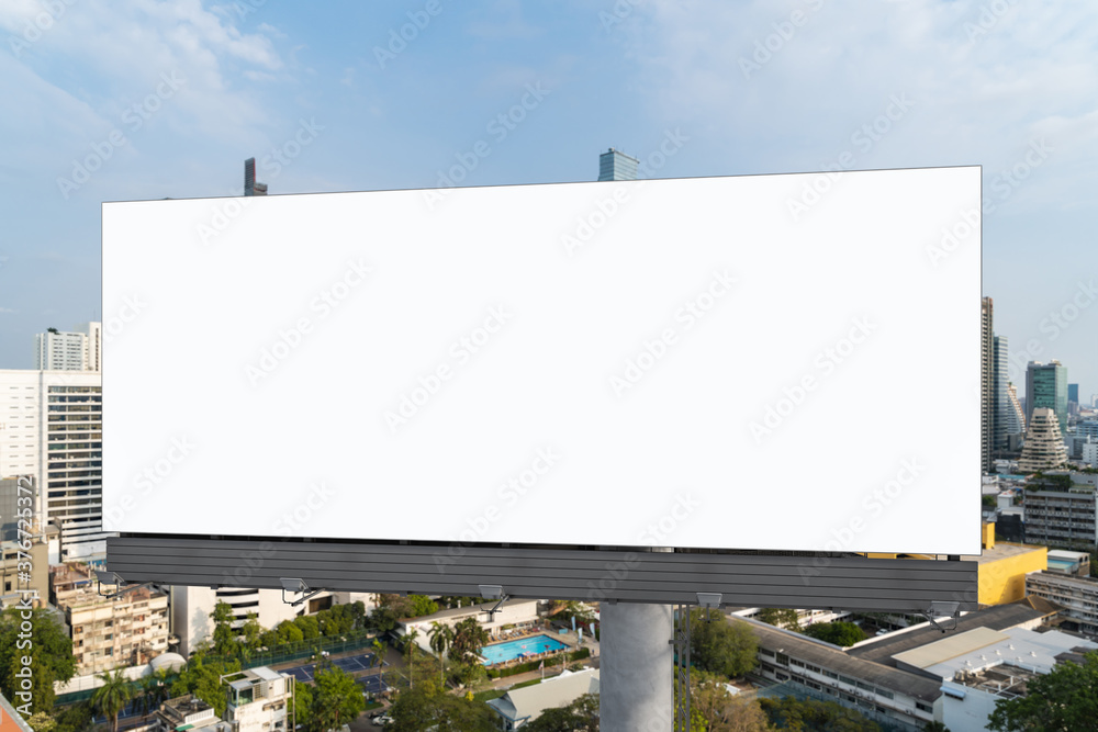 Fototapeta premium Blank white road billboard with Bangkok cityscape background at day time. Street advertising poster, mock up, 3D rendering. Front view. The concept of marketing communication to promote or sell idea.