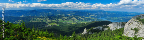 Durau village and Bicaz Lake Panorama. View from Ceahlau Mountain, Carpathian Mountains, Romania