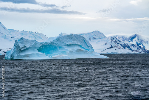 Antarctica, Peninsula, icebergs floating between Detail Island and Lemaire Channel. 